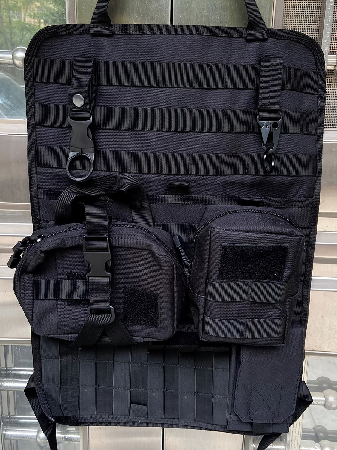 Taktischer Autositz-Organizer mit modularen Taschen